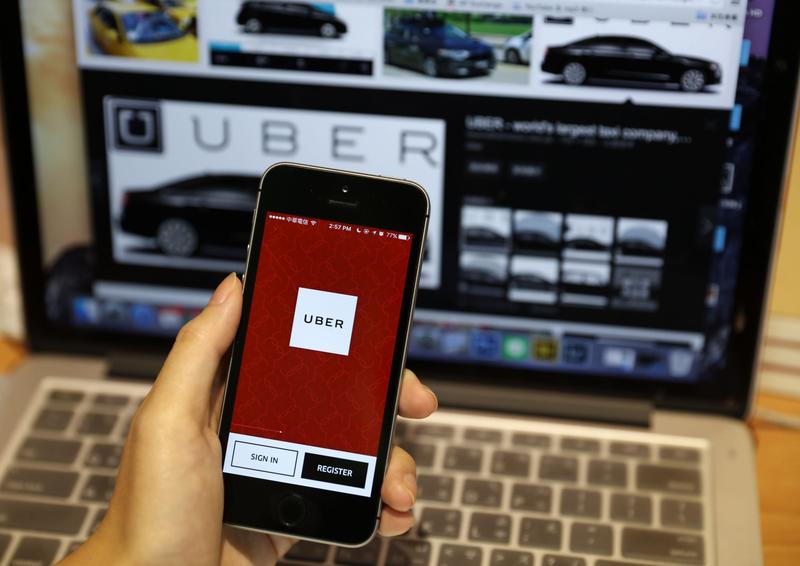 鄭伃倢／「共享經濟」圖利誰？Uber事件背後的爭議_1_Uber擁有最關鍵的客戶來是它的APP叫車功能。 （攝影／吳逸驊）