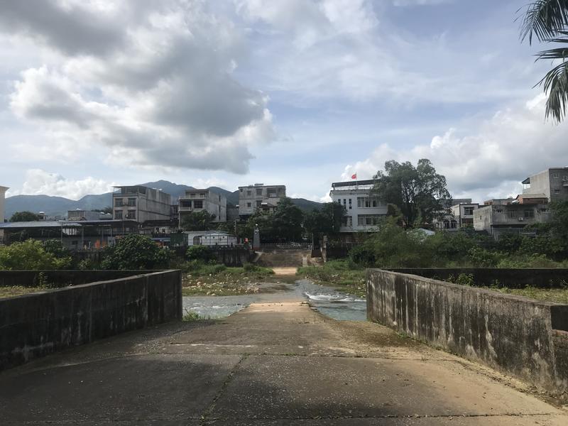The town of Dongxing, China, can be seen in the distance from its sister border town of Mong Cai in Vietnam. Here, our undercover journalists discovered an active underground trade route in wildlife including pangolins.
